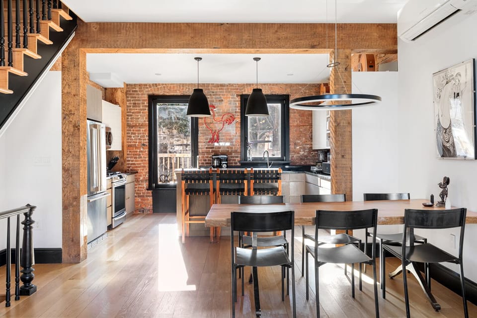 Dining/ working table. Modern chef's kitchen. 