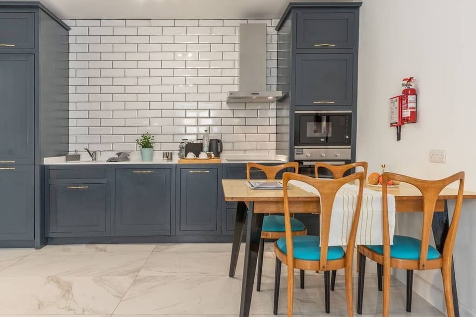 The kitchen-dining area with a fully equipped kitchen for your home-cooked meals.