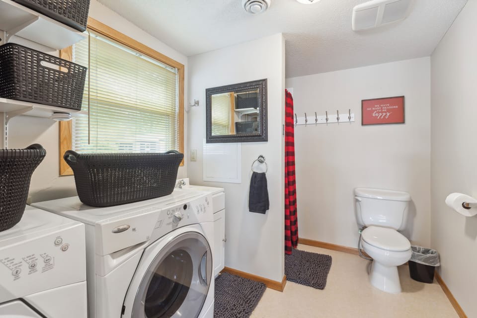 Bathroom #1 shower & toilet this bathroom adjoins to Bedroom #1 with King bed