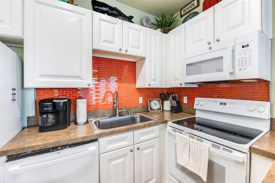 This kitchen is perfect for whipping up quick bites or indulging in culinary adventures during your stay