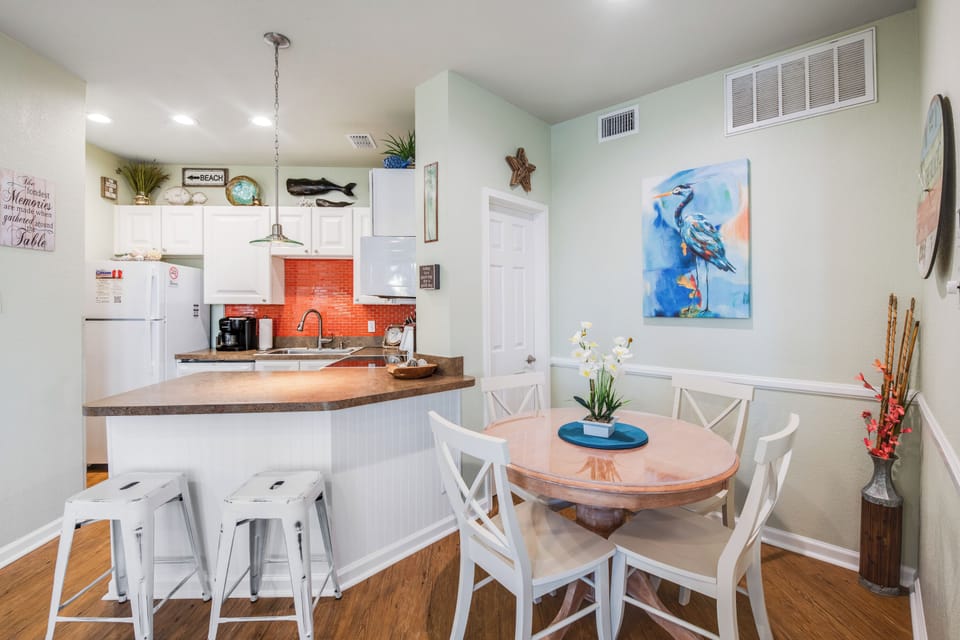 Dining and kitchen space with new seating for six