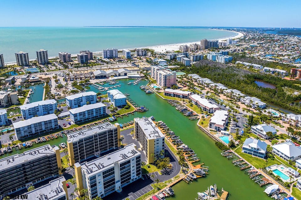 Hibiscus Pointe on Bay Beach Lane is surrounded by water.