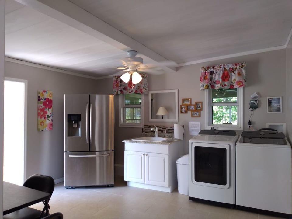 Extra refrigerator in laundry room