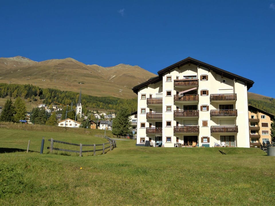 Sky, Building, Window, Plant, Mountain, Natural Landscape, Land Lot, Tree, Grass, Landscape