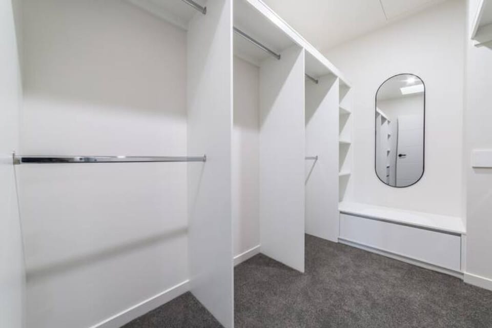 Master suite with walk-in robe, ensuite and optional cot on request.