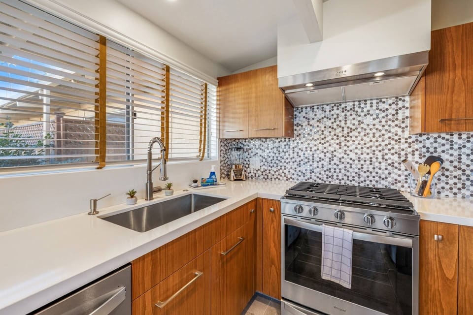 Kitchen looks onto the back patio and views to the Northeast