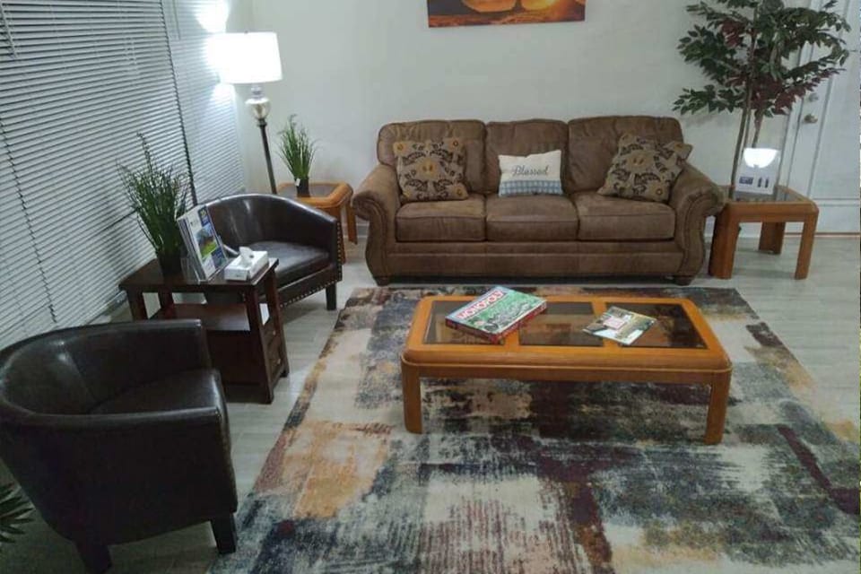 Nicely Furnished Living Room with new queen sleeper sofa.