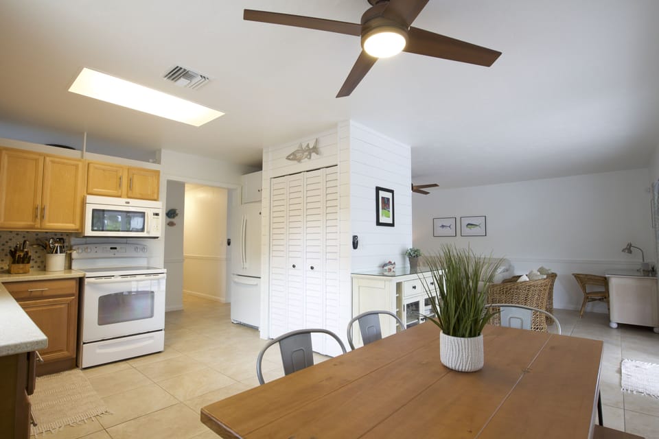 Kitchen and Dining Area.  Laundry is in closet located in Kitchen.