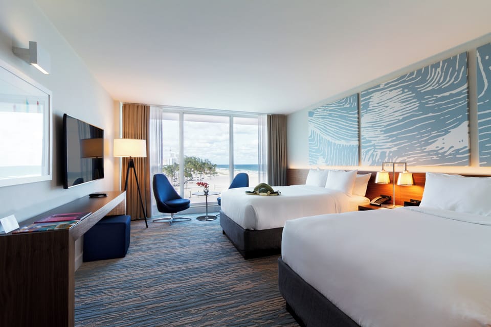 Wake up to sweeping views from this bright double-queen retreat.