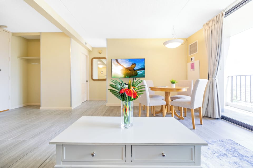 Entertain yourself with high-quality visuals from this 50-inch smart TV in the living room.