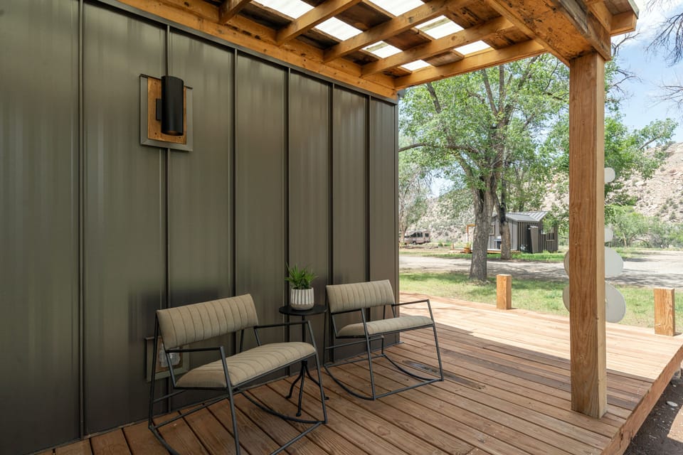 Each cabin has a patio with chairs and its own fire pit. 