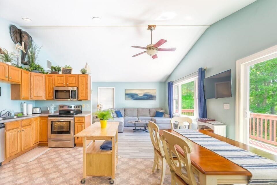 Open concept kitchen dining and living area. 