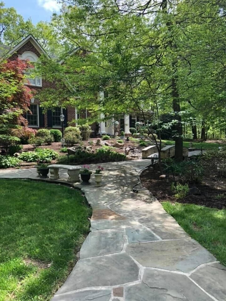 Lush landscaping & private setting for a countryside getaway. 