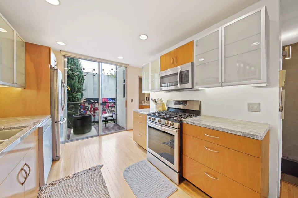 Full Kitchen | Leads to Private Balcony