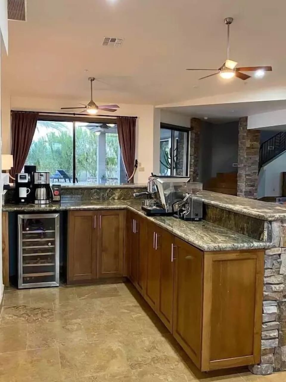 Dry bar with wine fridge and coffee station includes all the equipment! 