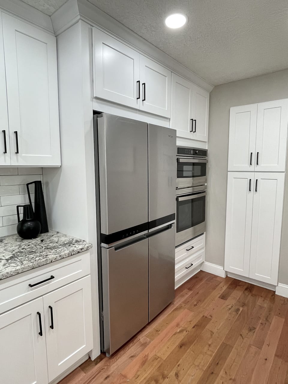 Stainless Steel Fridge and Wall in Oven and Microwave