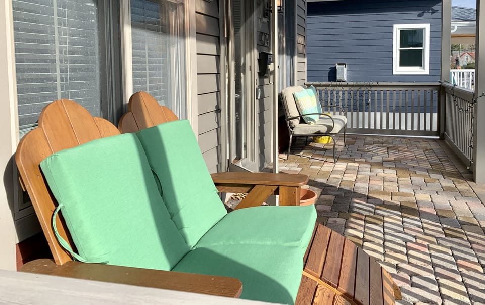 large front porch with lots of seating 