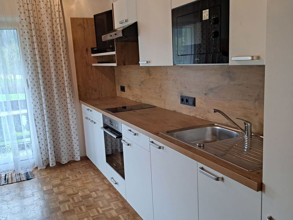 Kitchen Sink, Cabinetry, Countertop, Sink, Tap, Building, Plumbing Fixture, Kitchen, Kitchen Stove, Wood