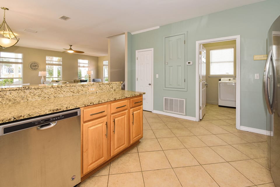 A Wave From It All - Kitchen with Laundry
