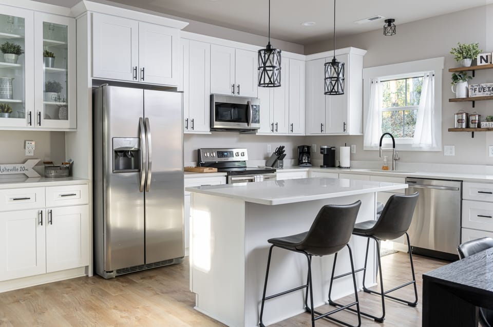 Well equipped kitchen with Keurig coffee maker.