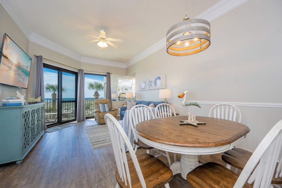Natural light floods the living room as you relax in the recliner and enjoy views of the palm trees and coast