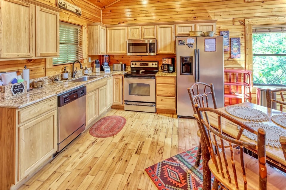 Open kitchen is well appointed with everything you need for cabin cooked meals.
