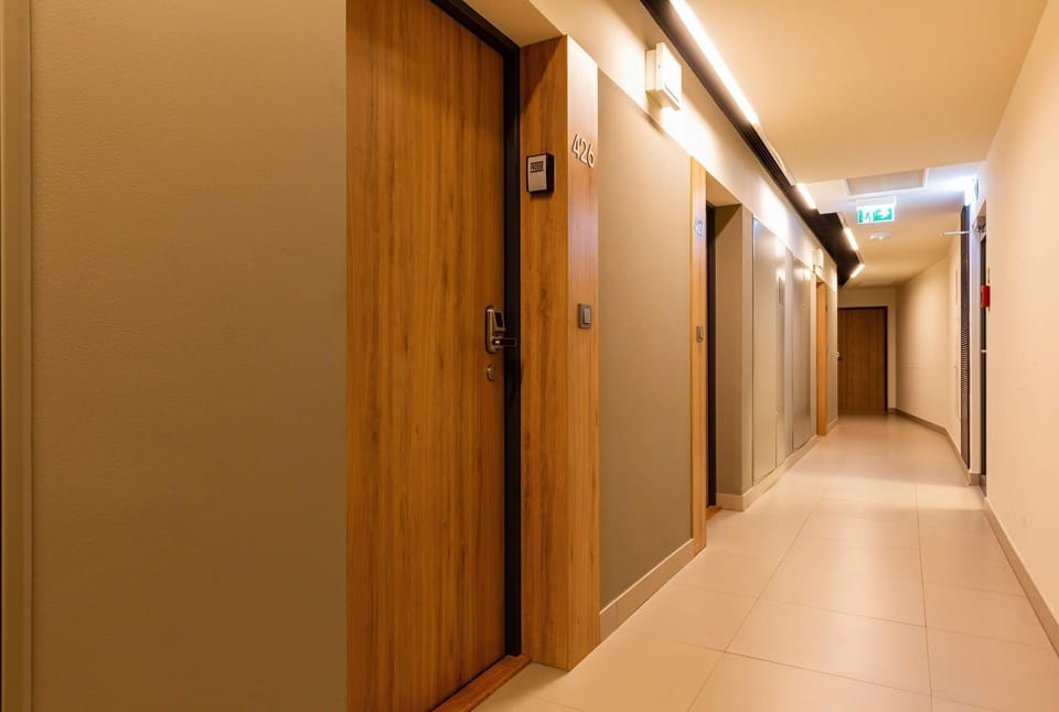 Entrance to the studio situated in the modern and elegant building.