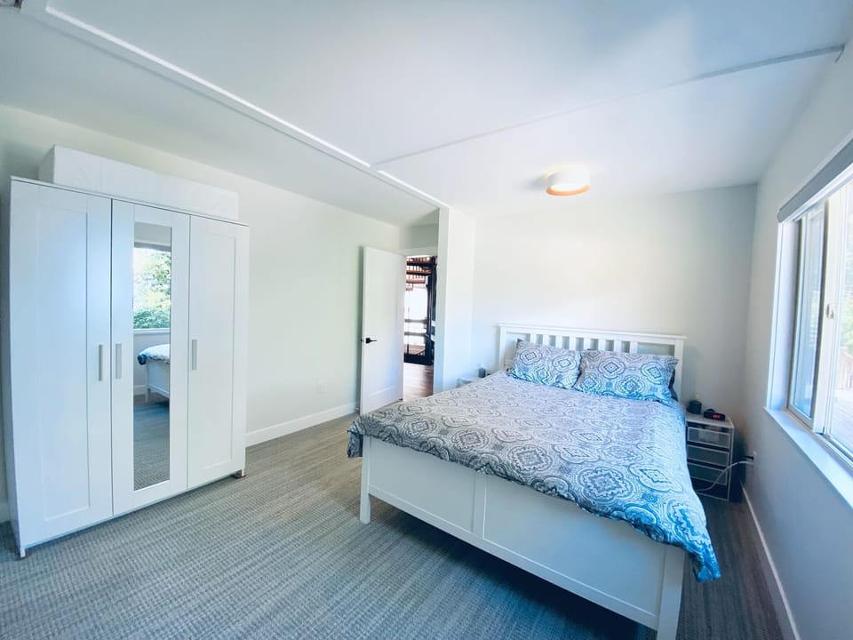Main Floor Queen Bedroom with Ocean views
