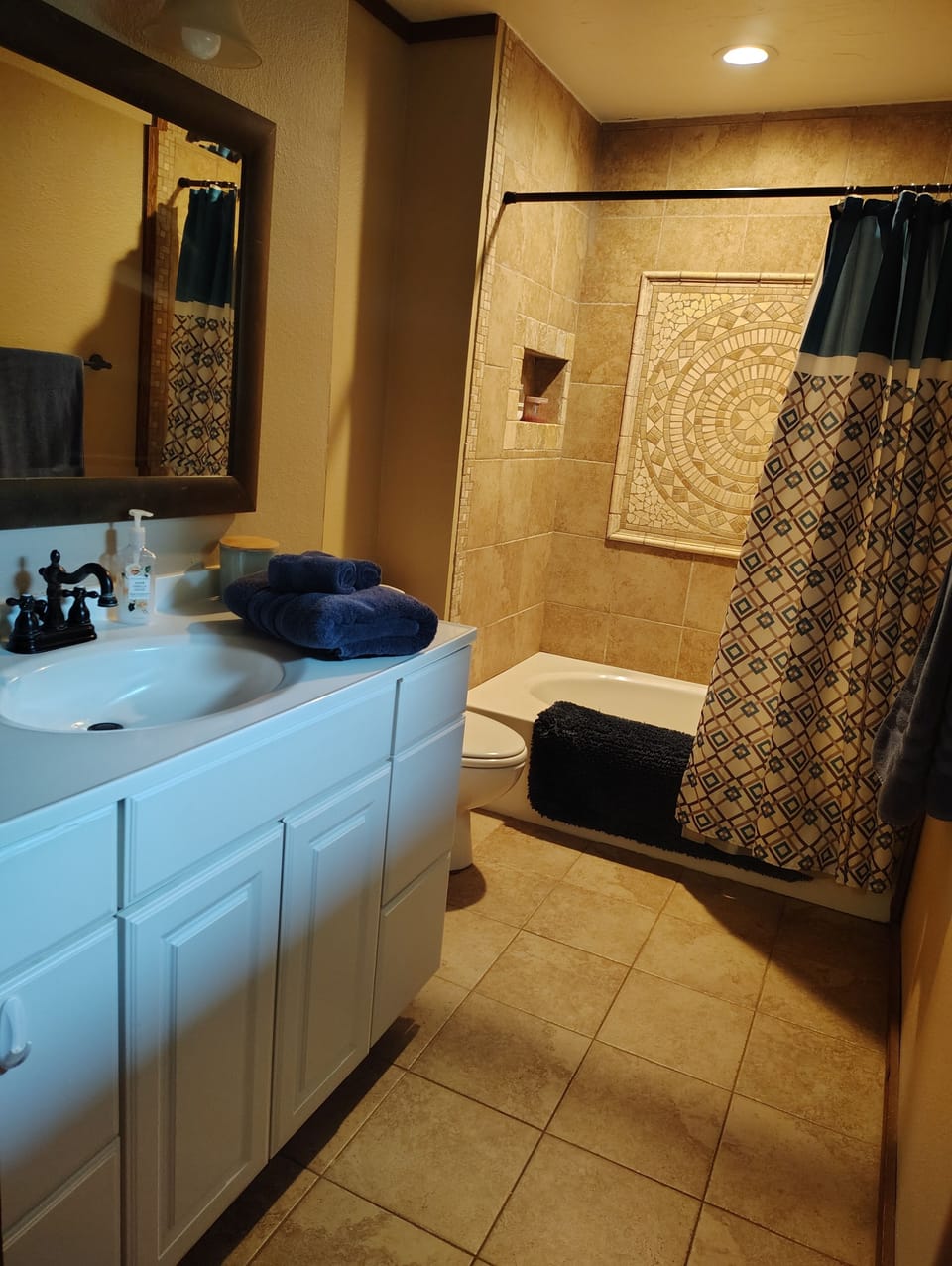shower, bathtub, indoor, bathroom shower, toilet. Attached to master bedroom 