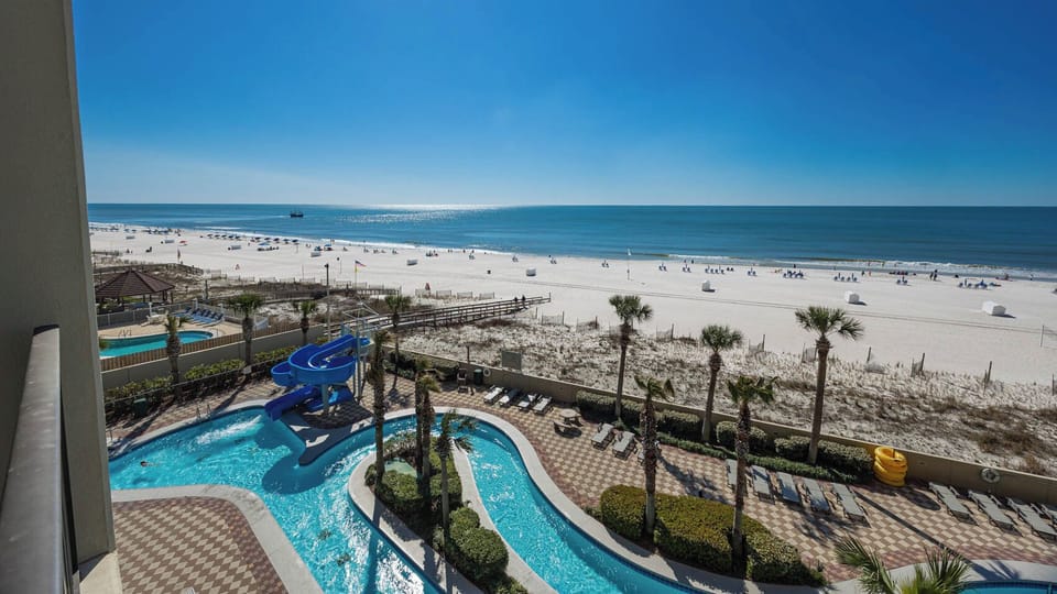 Savor vibrant coastal views while lounging by the pool, making lasting memories under the sunshine