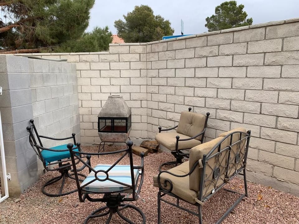 Backyard fire pit and seating area for a late night wine taste by the fire. 