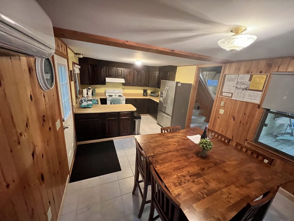 Dining Room area next to the kitchen.  New tile floors!

