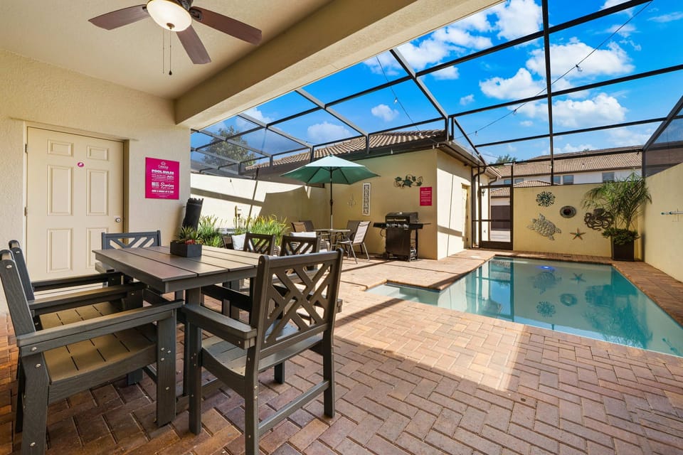 Enjoy the Outdoors Comfortably in Your Private Screened Pool Haven
