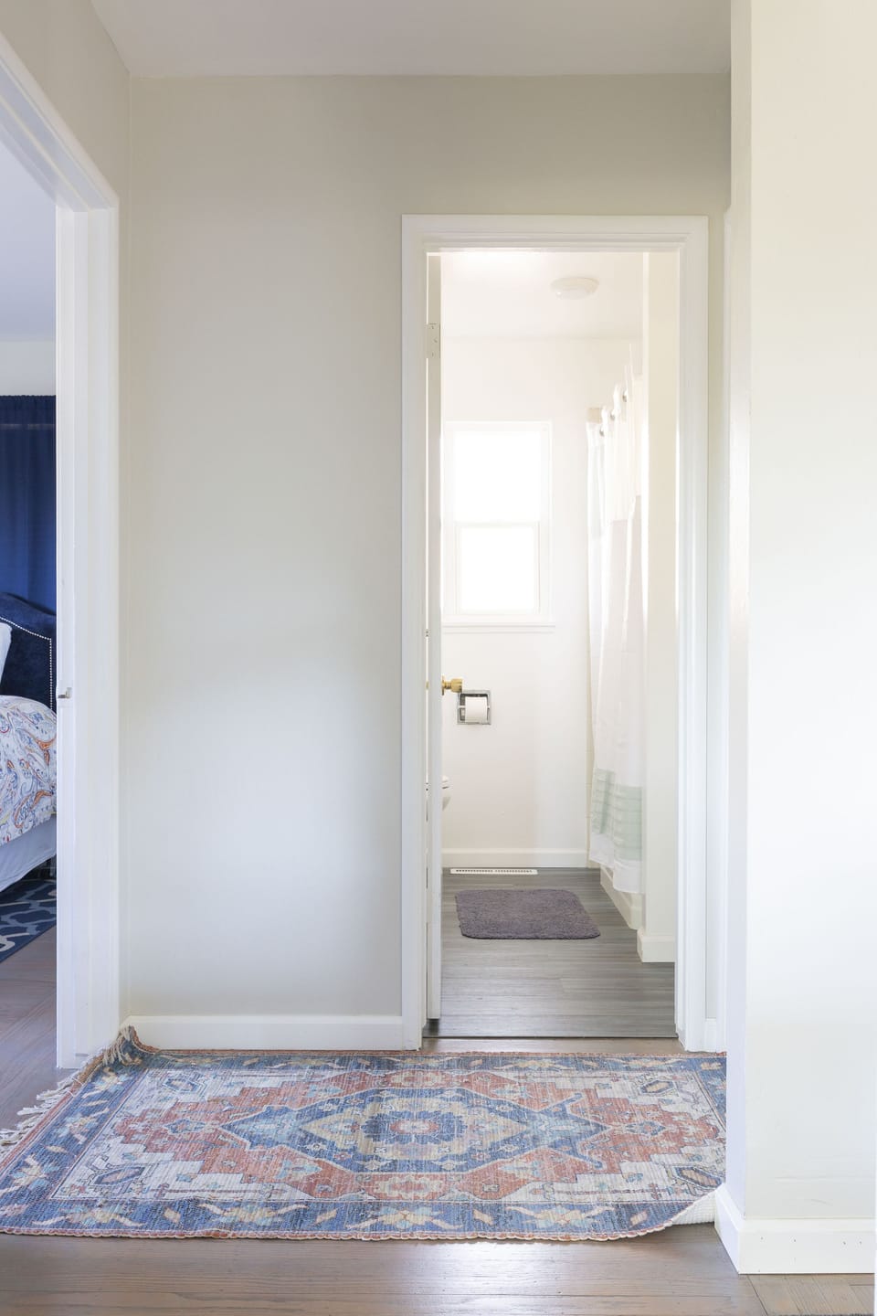 small hallway between bedrooms and bathroom