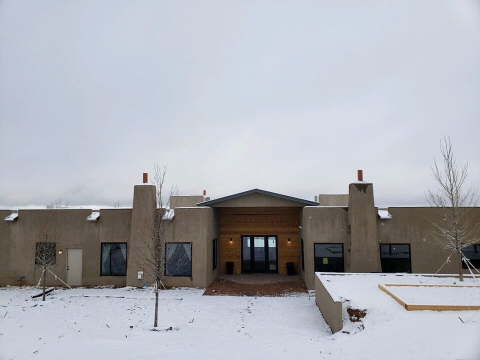 front door (south) with a little snow.