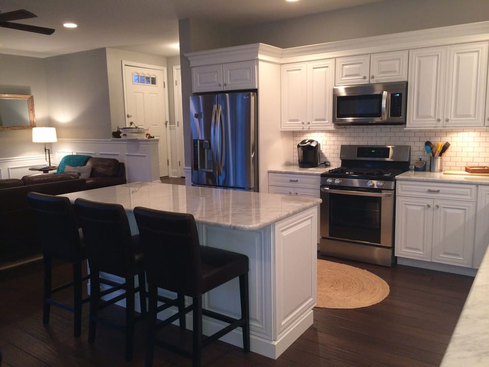 Gourmet Kitchen with Carrera Marble Tops and SS Appliances