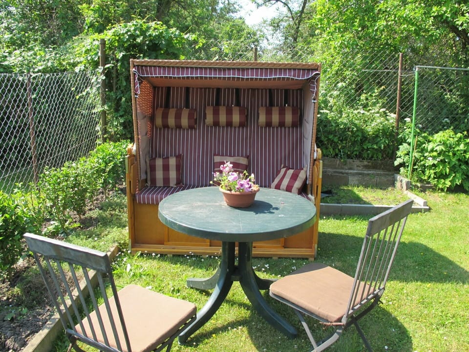 Plant, Furniture, Table, Property, Chair, Green, Outdoor Table, Outdoor Furniture, Wood, Grass