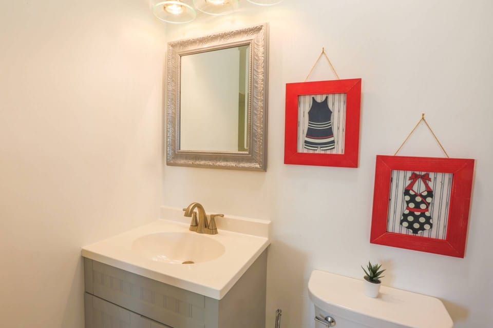 This bathroom is accessed from the hallway near two of the guest bedrooms.