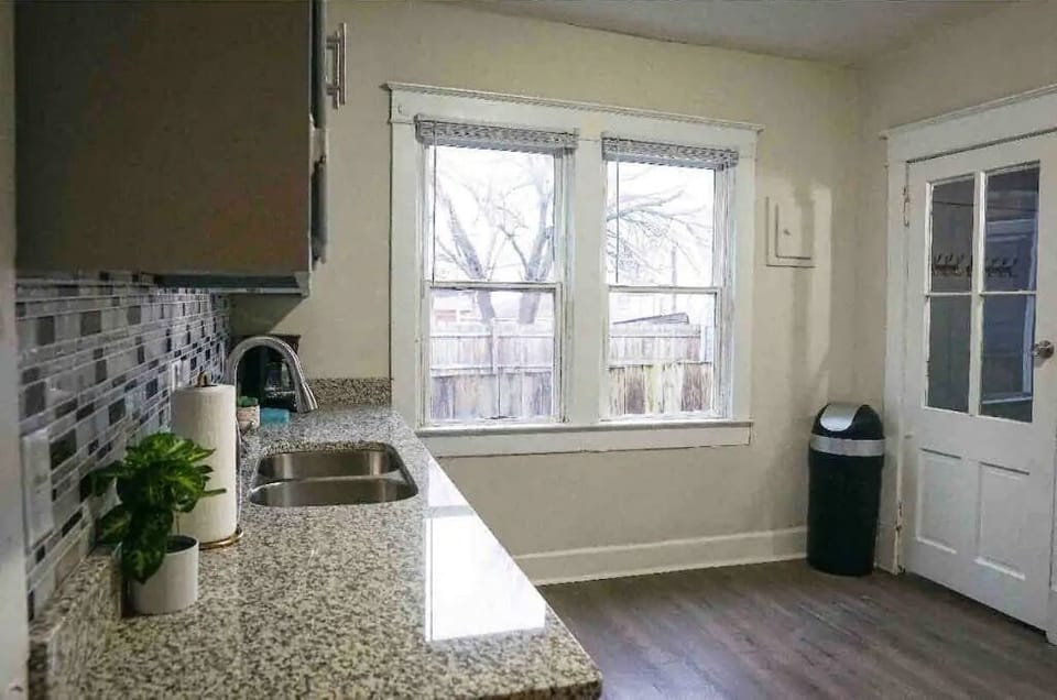 Granite countertops in this modern kitchen