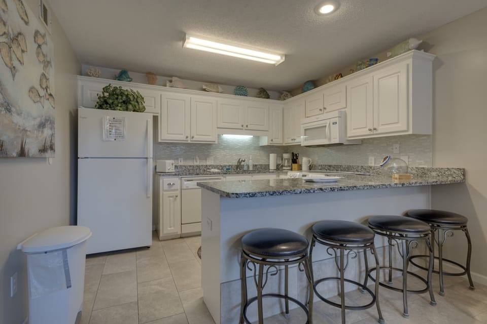 Kitchen has everything you need to make a gourmet meal 
