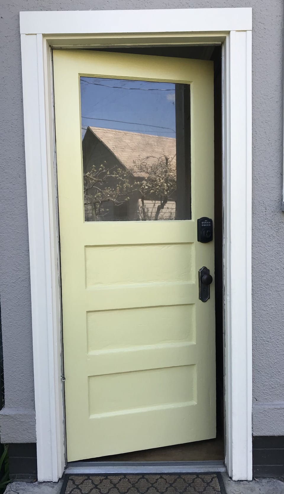 Entrance with keypad entry.  The entry stairs have a handrail, but small landing
