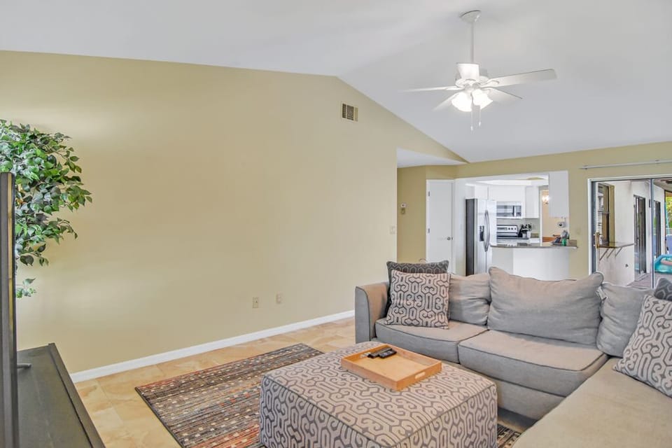 Newly decorated living room area with flatscreen tv, cable, internet, and DVD 
