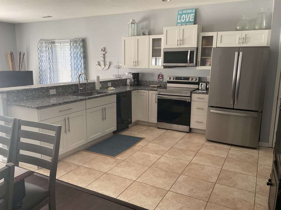 Full kitchen including a French door fridge for all the goodies!