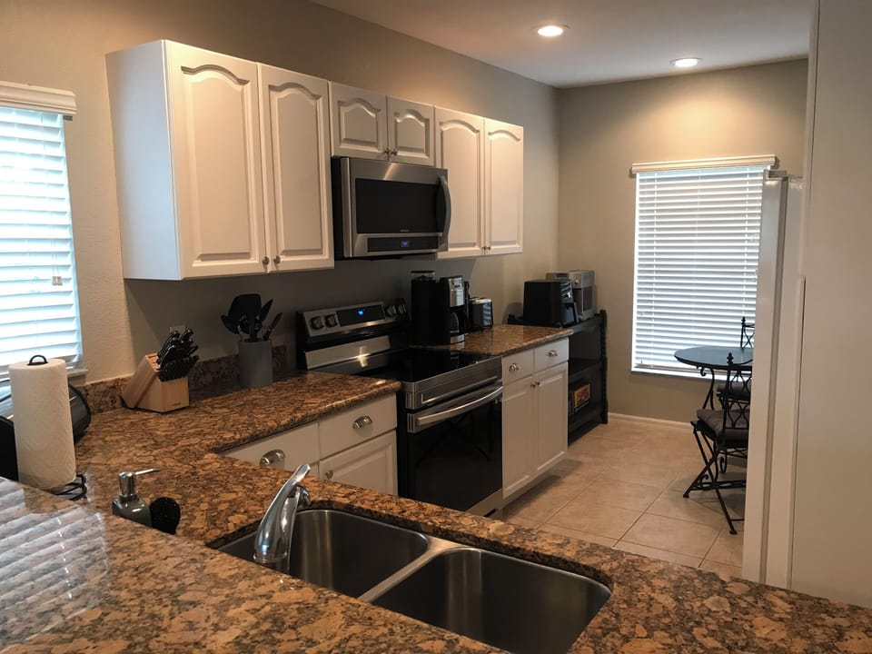 Newly painted cabinets and brand new stainless appliances