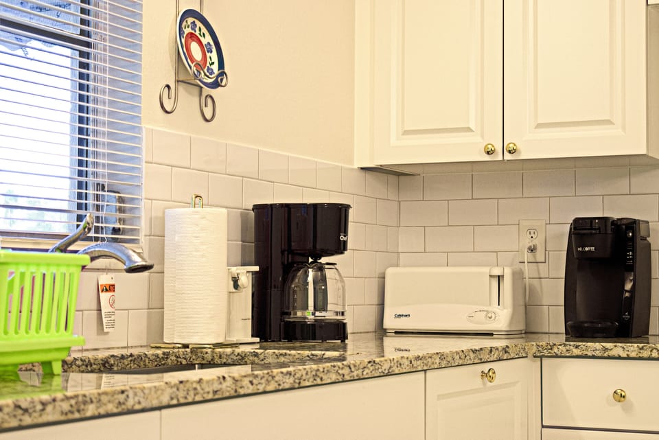Kitchen counter with coffee makers and toaster