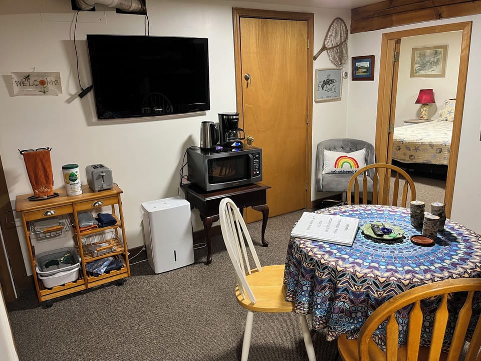 Microwave, coffee pot, water kettle, toaster, and dehumidifier, and TV