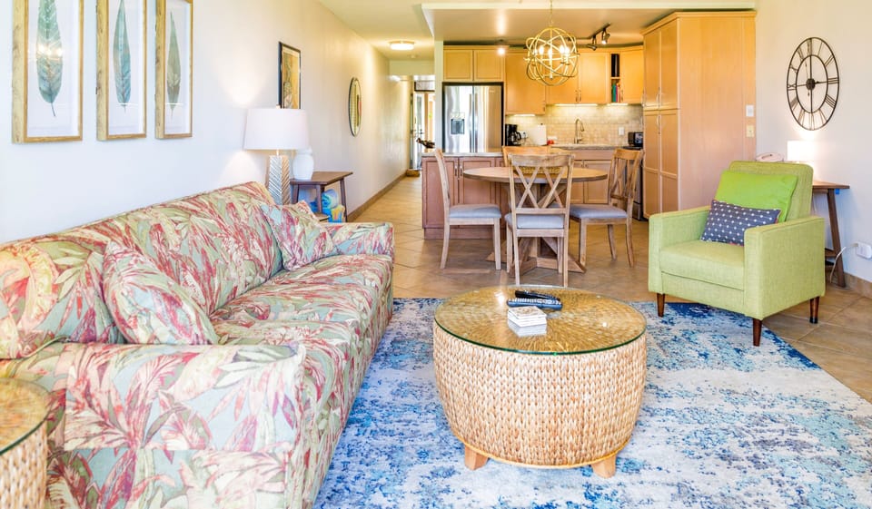 Bright and spacious living area with queen-sized pull-out sofa bed.