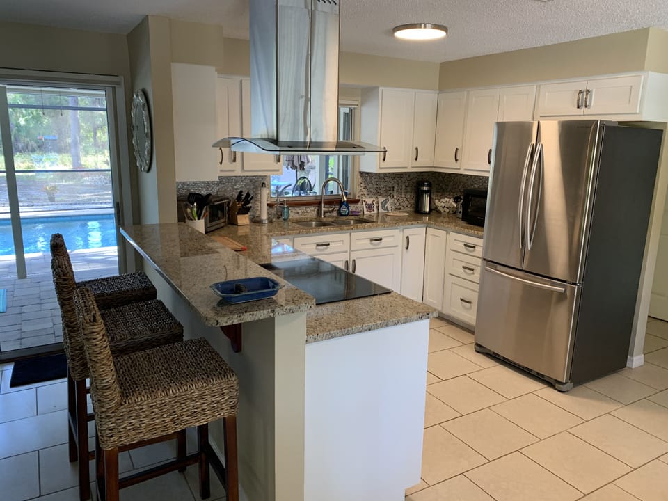 Kitchen with countertop dining