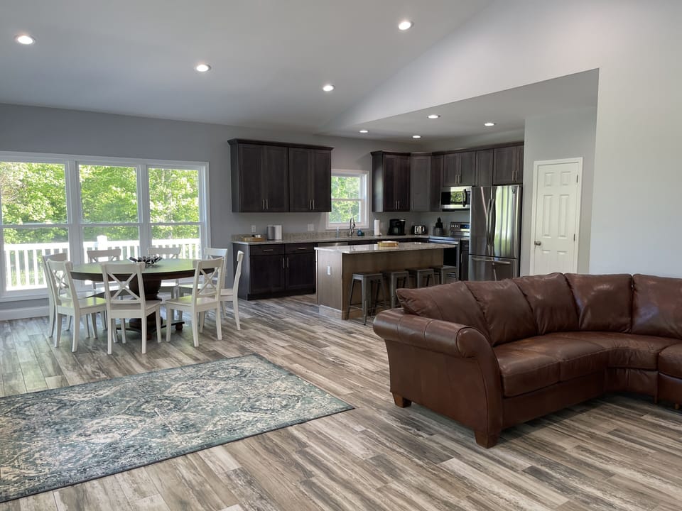 Designer great room, kitchen and dining area built in 2021