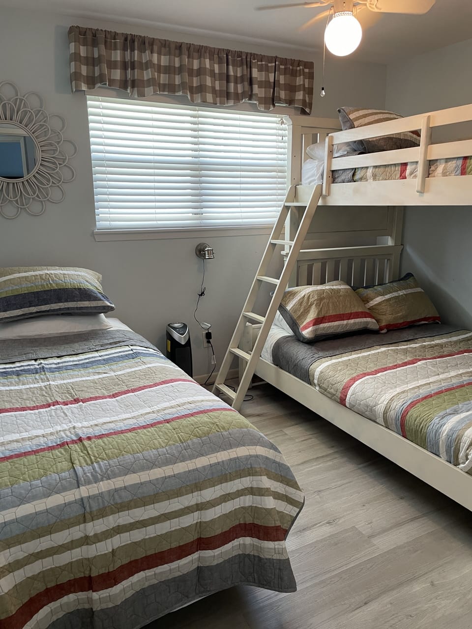Bunk room with twin over full and another twin